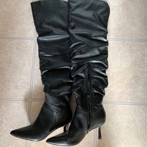 Women’s size 7, over the knee Stiletto boots